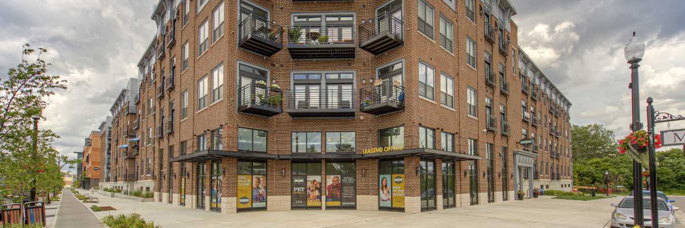 Exterior view of Midtown Flats apartment building in Carmel